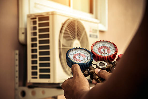 Professional Ac Installation technician working in Osseo, WI